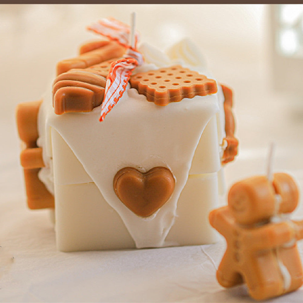 Gingerbread Candles in a festive design with cute gingerbread shapes for holiday decor
