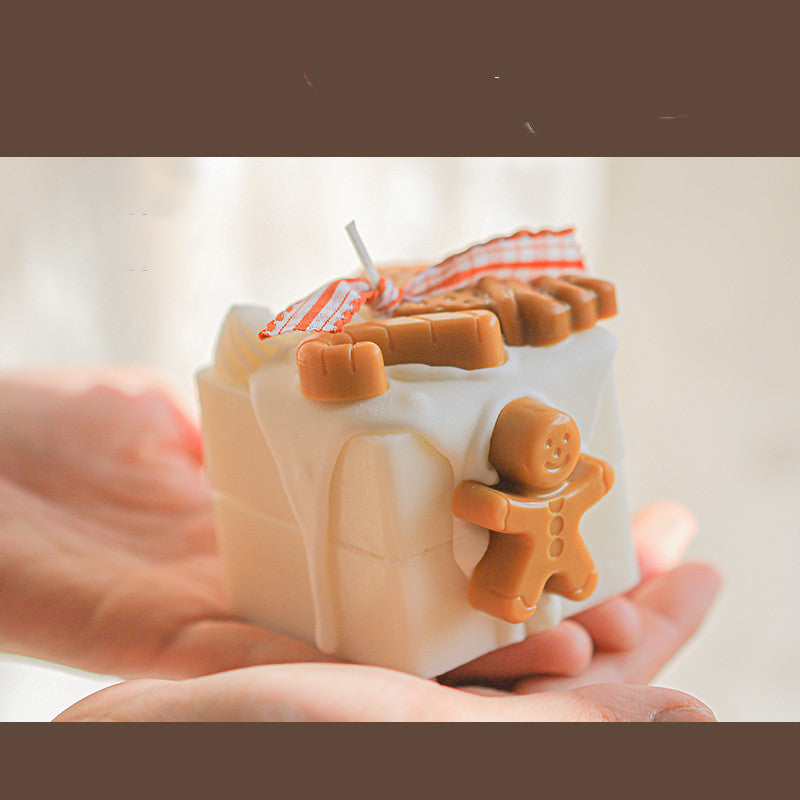 Gingerbread Candles with festive icing and gingerbread figures perfect for holiday decorations
