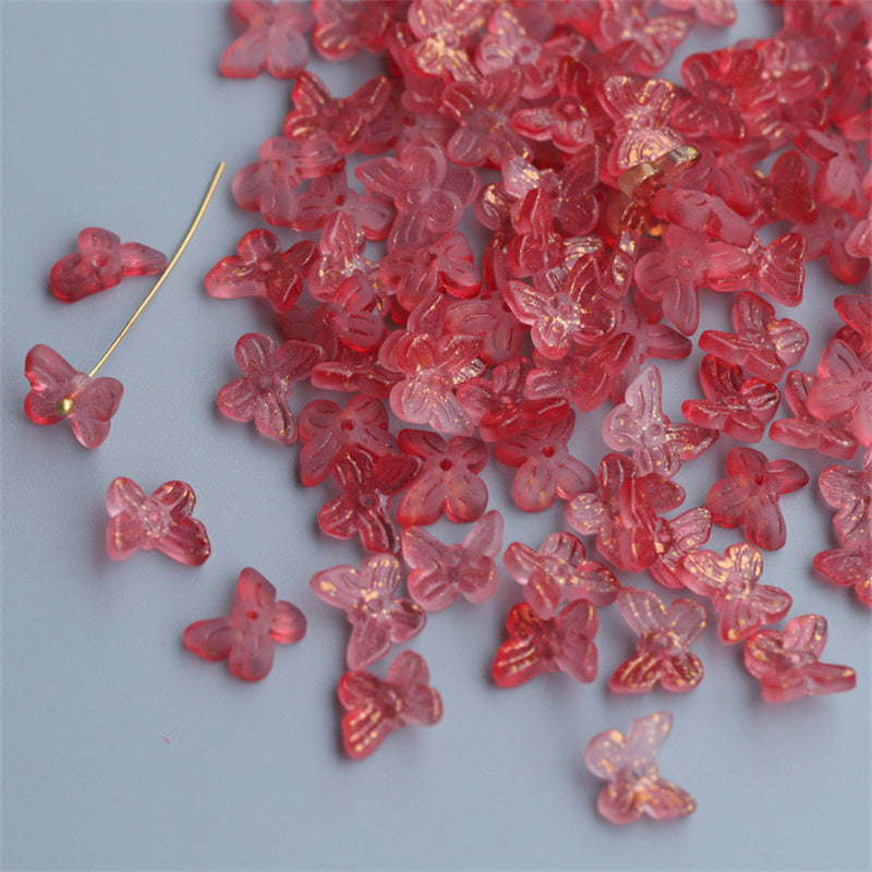 Pink butterfly shaped beads for DIY craft projects from Arts And More hairpin materials