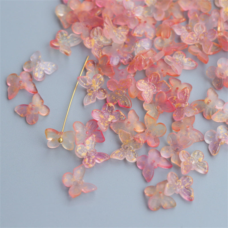 Pink and translucent butterfly-shaped beads for hairpin materials from Arts And More craft supplies