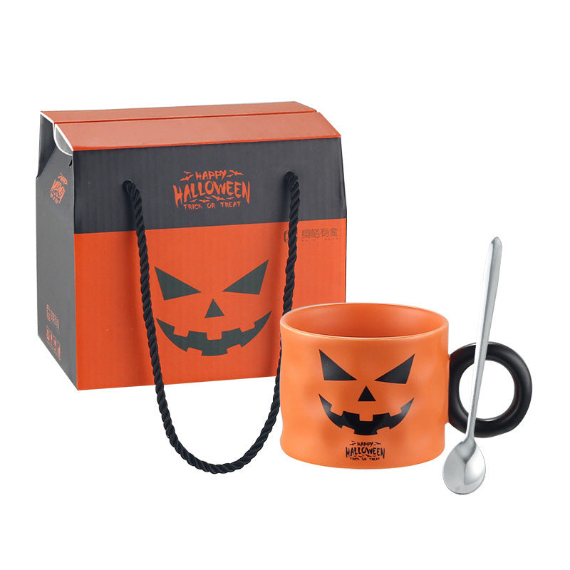 Pumpkin Cup with Halloween design and spoon, perfect for festive seasonal drinks