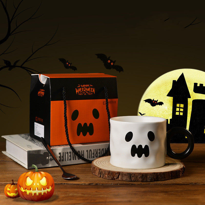 Arts And More Pumpkin Cup with Ghost Design, perfect for Halloween celebrations and cozy drinks