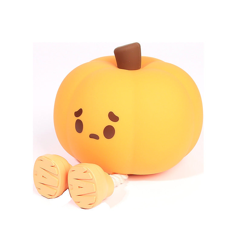 Cute Halloween Pumpkin Night Light with a sad face, perfect for festive decor and children's rooms