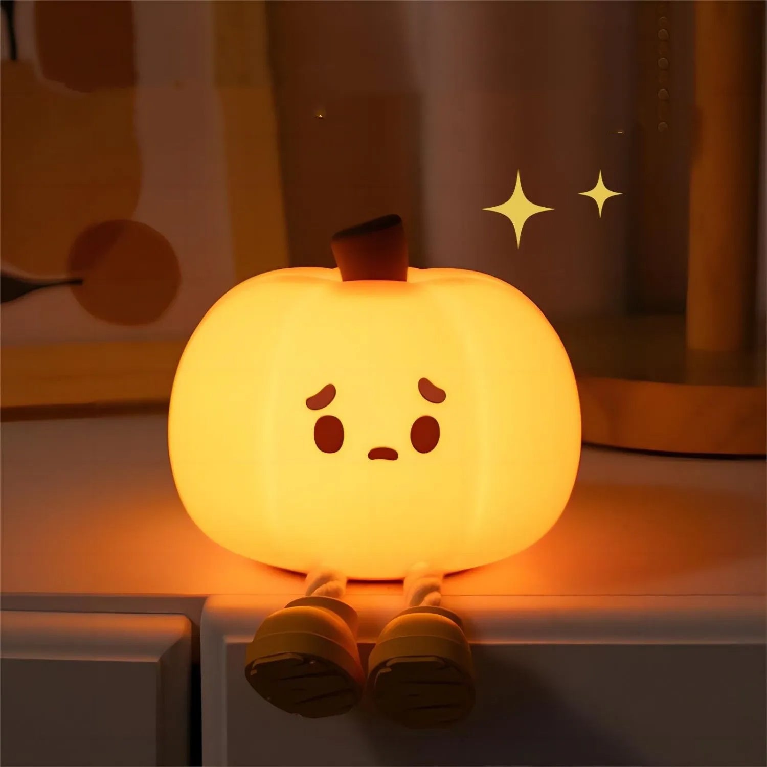 Cute Halloween Pumpkin Night Light with a sad expression and little legs for cozy decorations