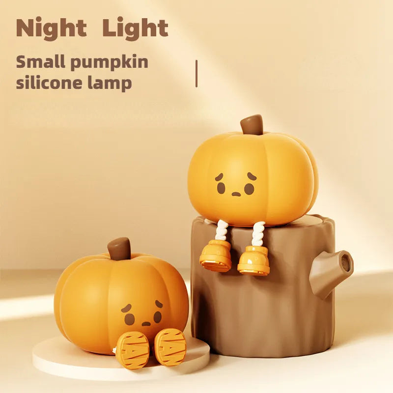 Cute Halloween Pumpkin Night Light featuring small silicone pumpkins on a wooden stump