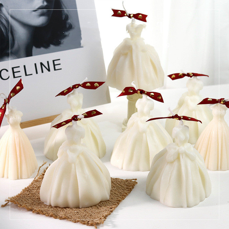 Handmade Scented Candle in the shape of a dress with decorative ribbons for elegant decor