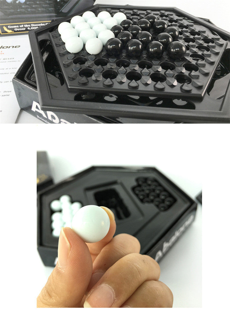 Hercules Puzzle arts and crafts kit with black and white game pieces on hexagonal board