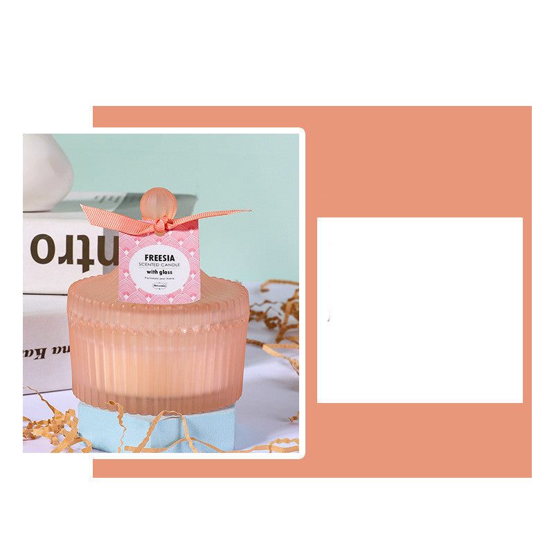 Indoor Scented Candle Gift in a decorative jar with a pink bow and fragrant freesia scent