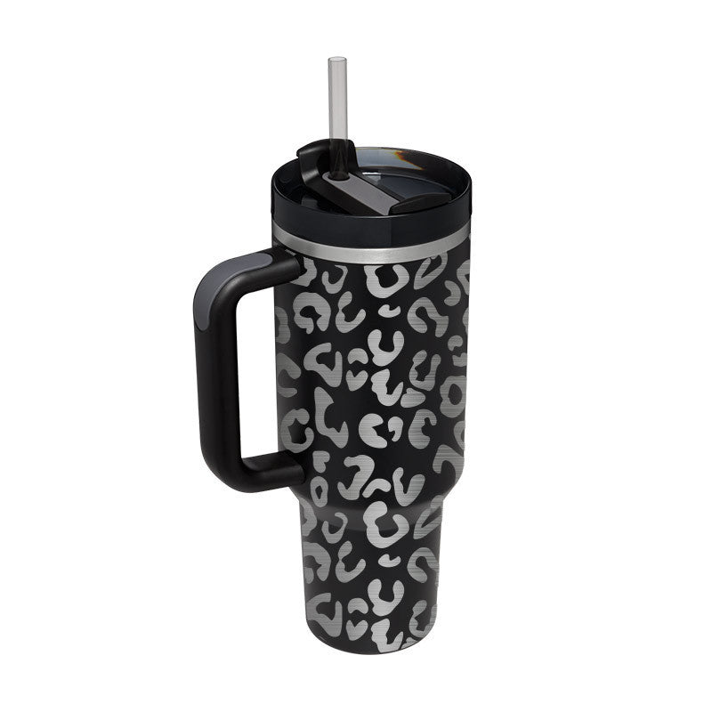 Arts And More insulated tumbler with handle in black and gray leopard print with straw lid