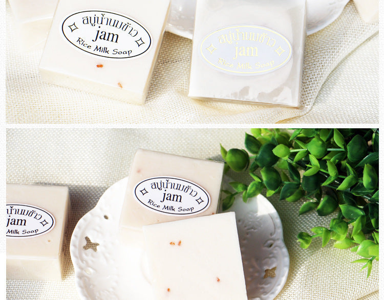 Arts And More Jasmine Rice Soap bars with natural ingredients displayed on white plates and green leaves