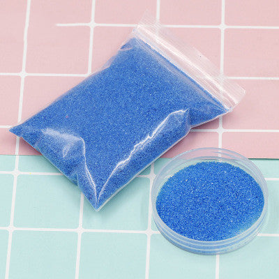 Arts And More Kids DIY Kit Magic Sand in blue color in a plastic bag and container for creative play