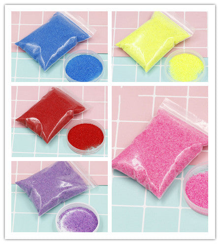 Colorful Magic Sand in assorted bags for kids' DIY kits with vibrant shades for creative projects