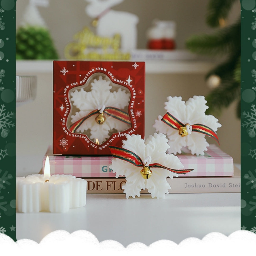Snowflake Christmas Candle Gift set featuring decorative candles and festive packaging
