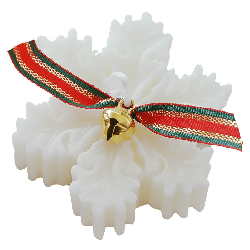 Snowflake Christmas Candle Gift with festive ribbon and bell, perfect for holiday decor