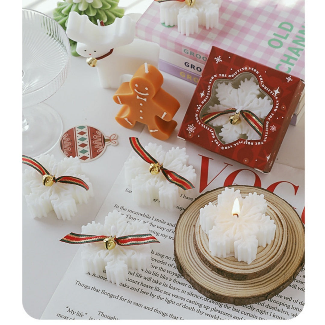 Snowflake Christmas Candle Gift displayed with festive decorations and a cozy holiday setting