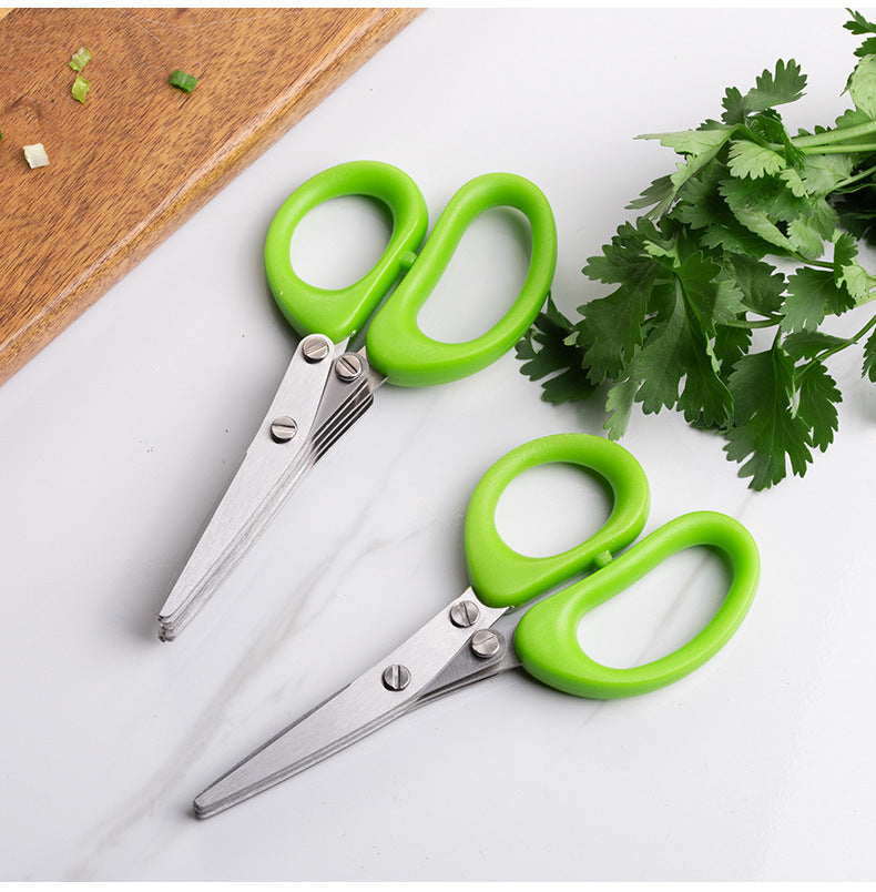 Multi-functional Scissors with ergonomic green handles for easy kitchen tasks and herb cutting