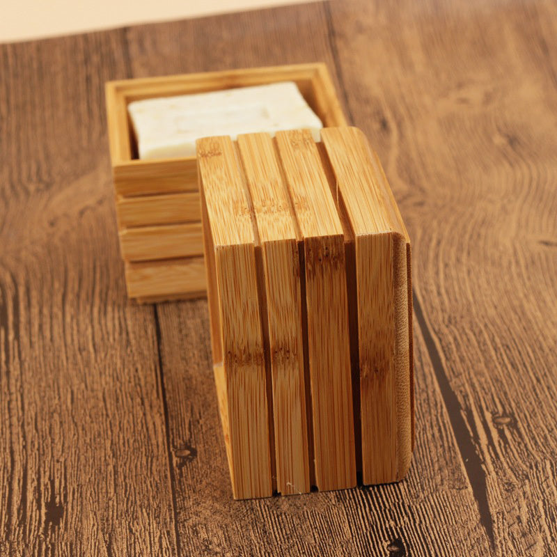 Natural Lotus Soap Box by Arts And More made of bamboo with soap inside on wooden surface