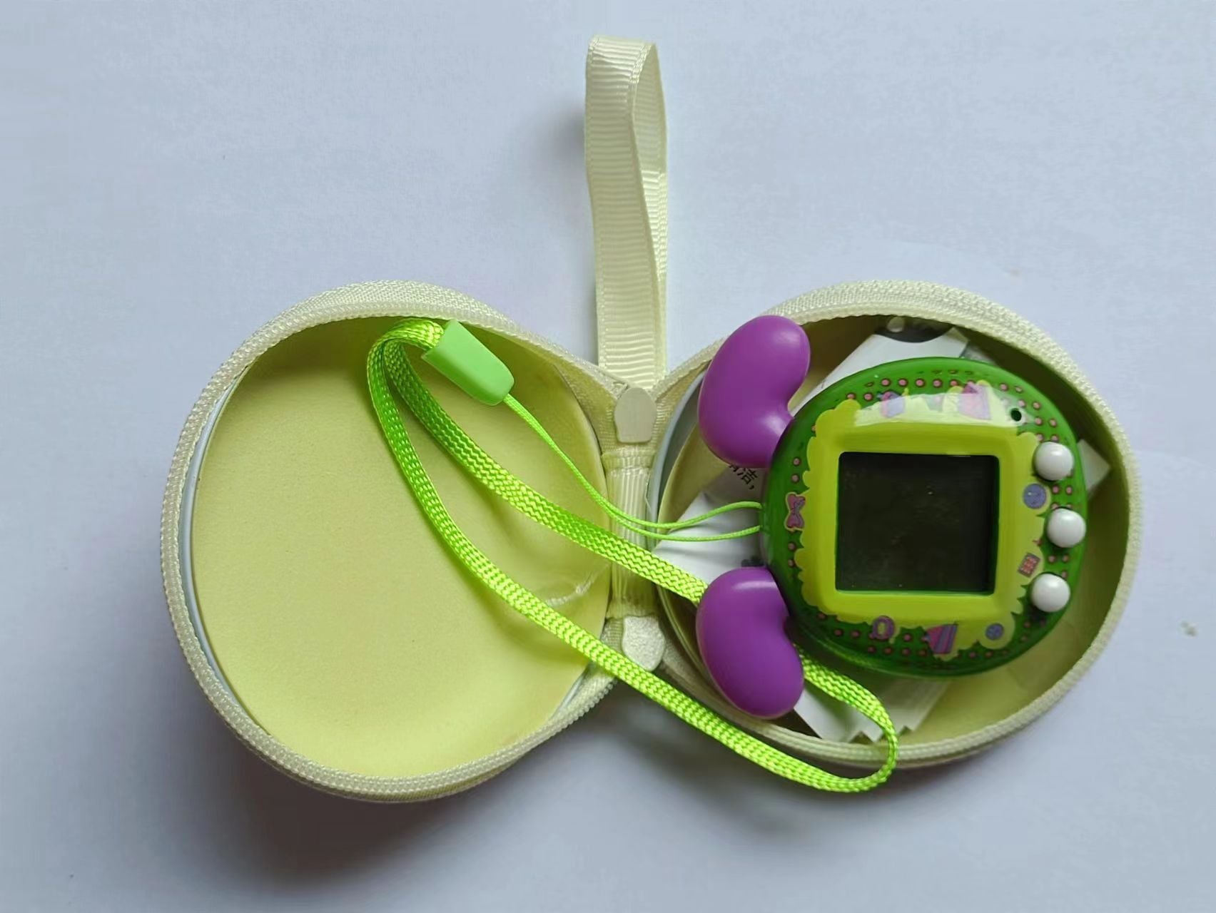 Pet Machine Elf Kids DIY Kit with vibrant green design and earphones for interactive pet care fun