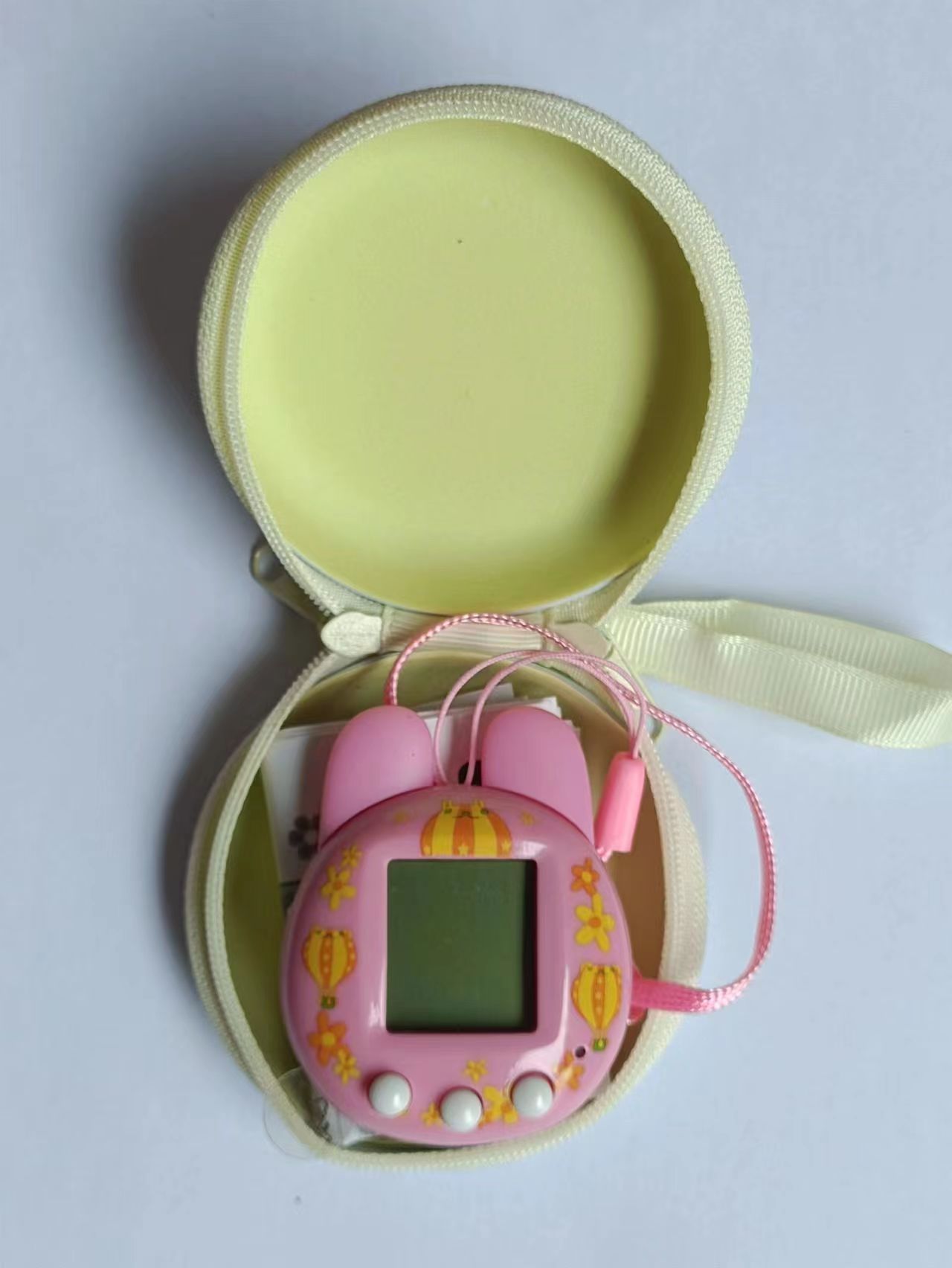 Pet Machine Elf kids DIY kit in a pink case featuring a bunny design with earphones