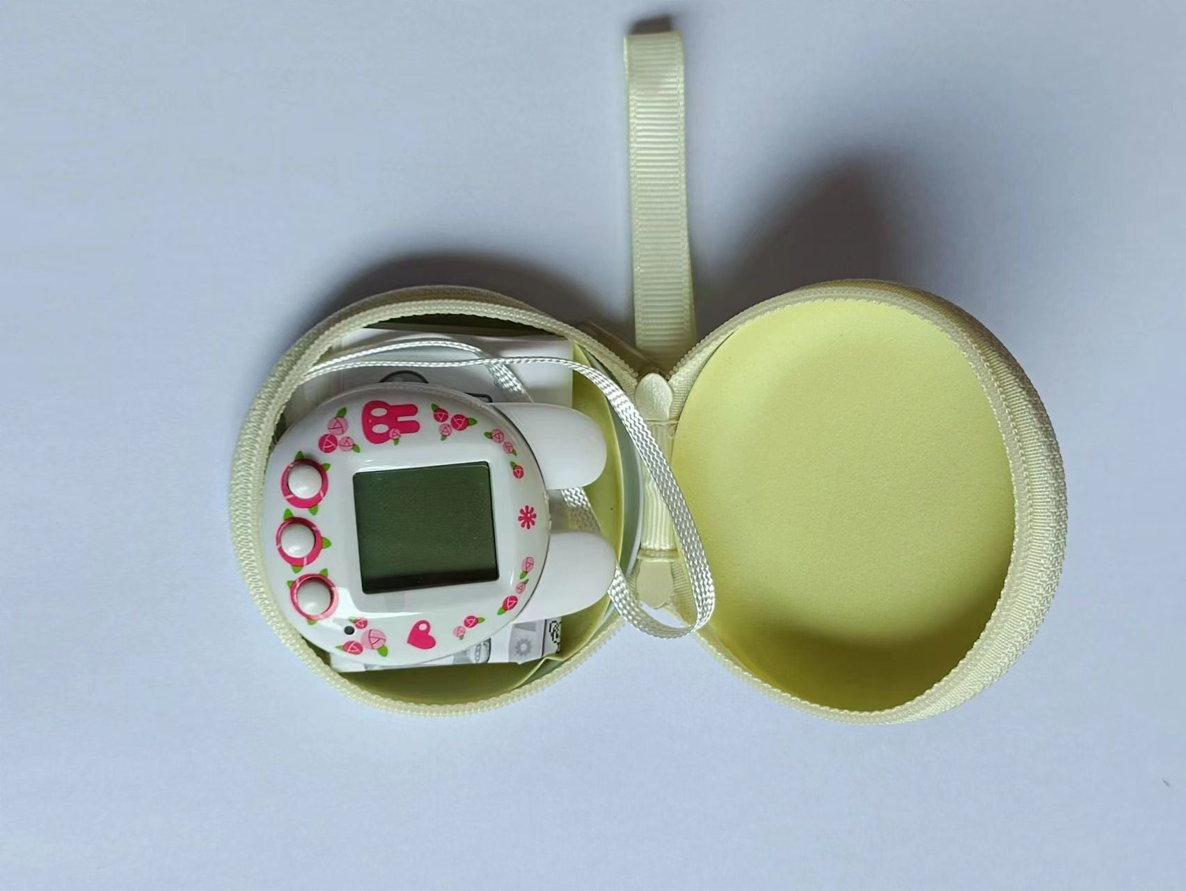 Pet Machine Elf Kids DIY Kit with a pink and white design in a protective case