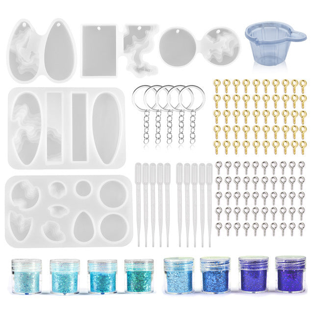 Arts And More Resin Jewelry Silicone Molds craft set with keychains, droppers, glitter powders, and measuring cup