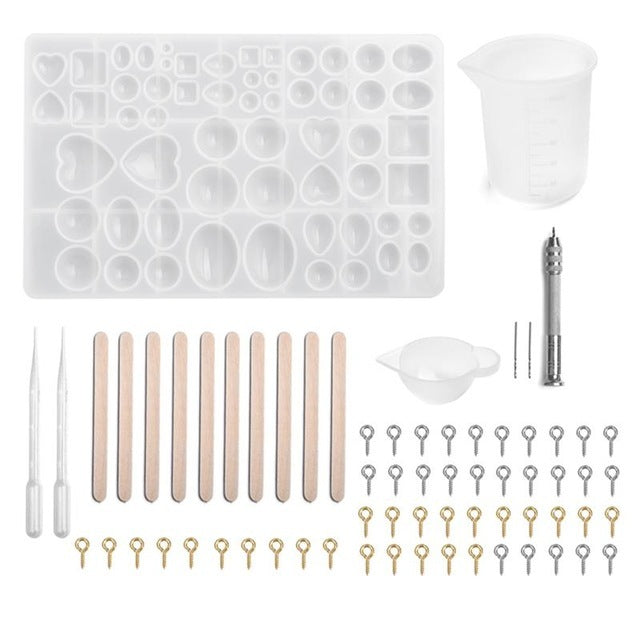 Arts And More Resin Jewelry Silicone Molds kit including silicone molds, measuring cup, mixing tools, and jewelry findings