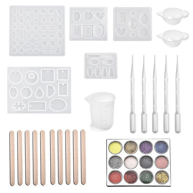 Arts And More resin jewelry silicone molds set with measuring cup pipettes mixing sticks and glitter powders for crafting