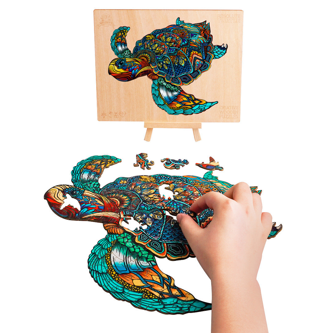 Turtle Wooden Puzzle by Arts And More showing colorful turtle design being assembled by hand