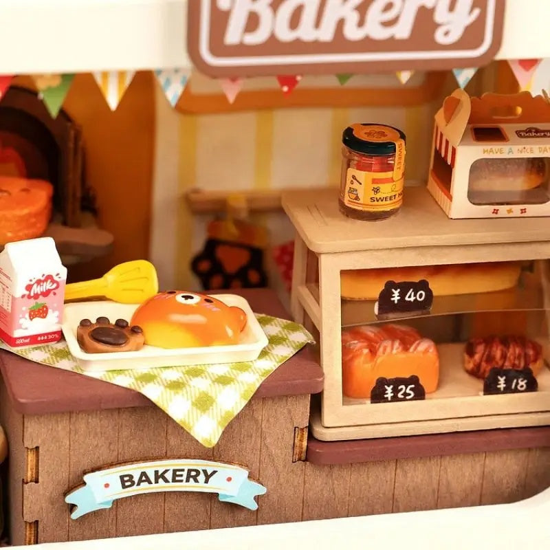 Rolife Food Box Shop DIY Miniature Kit featuring a detailed bakery display with treats