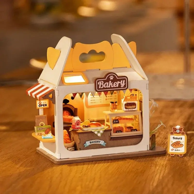 Rolife Food Box Shop DIY Miniature Kit showcasing a charming bakery with detailed pastries and lighting
