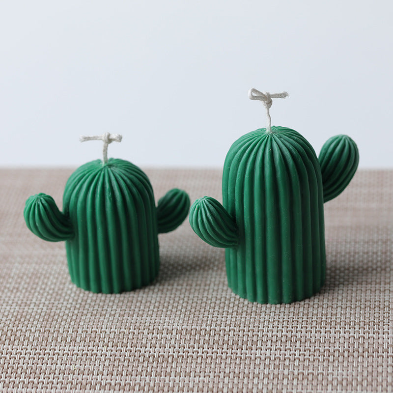 Unique green cactus-shaped candles made with a Silicone Candle Mold by Arts And More