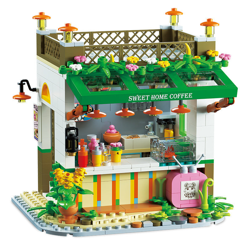 Small House Puzzle Toy featuring a colorful coffee shop design with flowers and outdoor seating