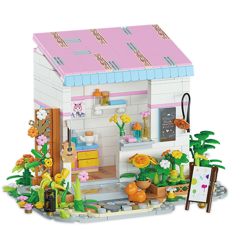 Small House Puzzle Toy kit with colorful building blocks and detailed garden accessories