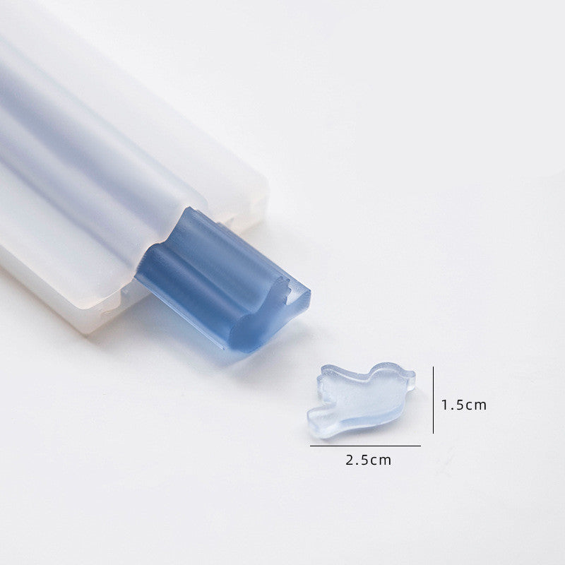 Arts And More Soap Silicone Mold in blue for creating small bird-shaped soaps measuring 2.5 by 1.5 centimeters