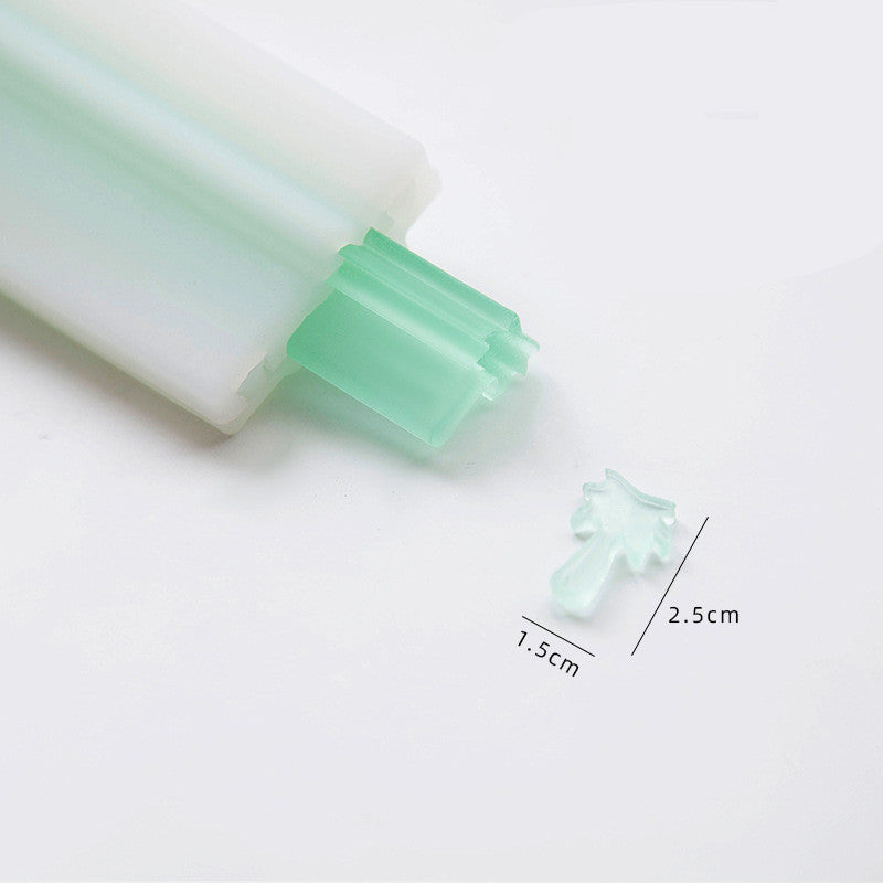 Arts And More Soap Silicone Mold in green for crafting small cross-shaped soaps with size measurements