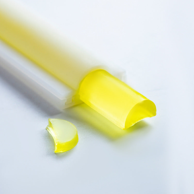 Yellow translucent soap bar and Soap Silicone Mold from Arts And More on white background