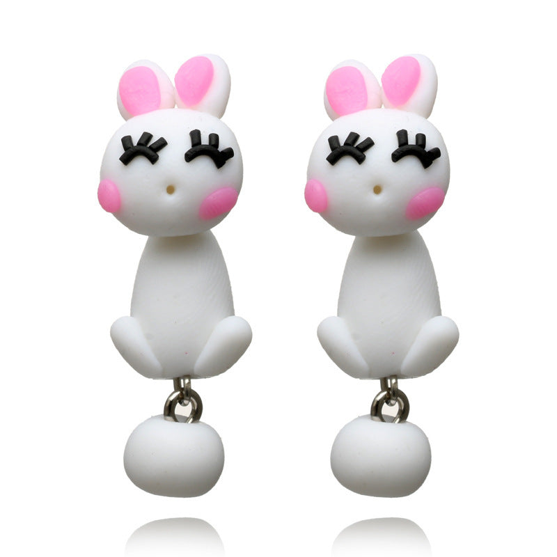 Cute white and pink bunny soft clay earrings with closed eyes and round tails by Arts And More