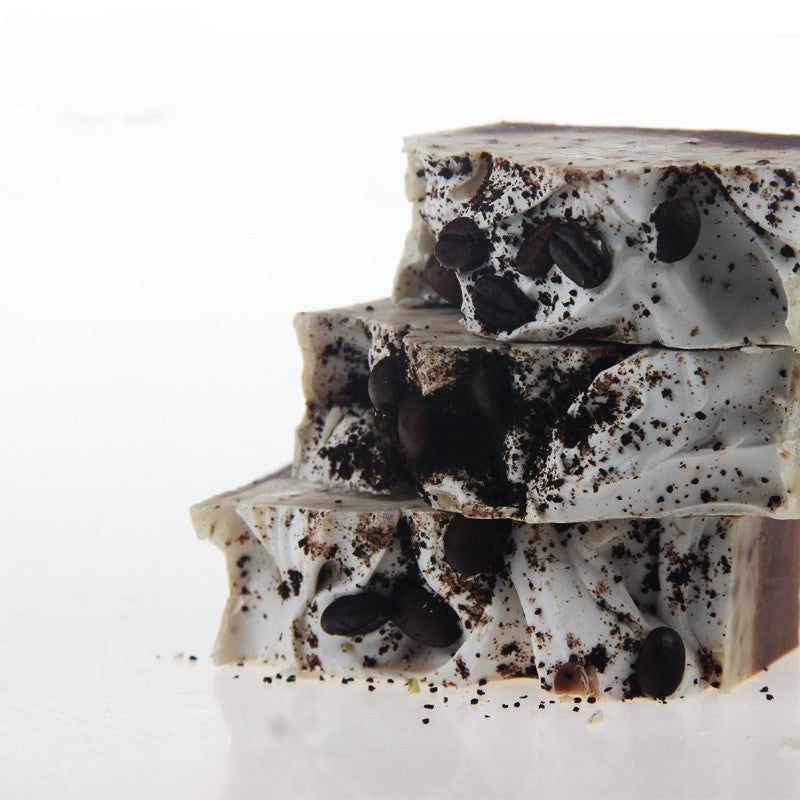Stacked bars of Coffee Essential Oil Soap with embedded coffee beans and creamy swirls by Arts And More