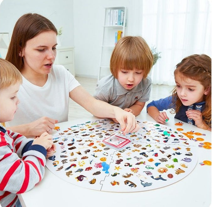 Family playing Find It Table Game arts and crafts kit with colorful hidden object illustrations