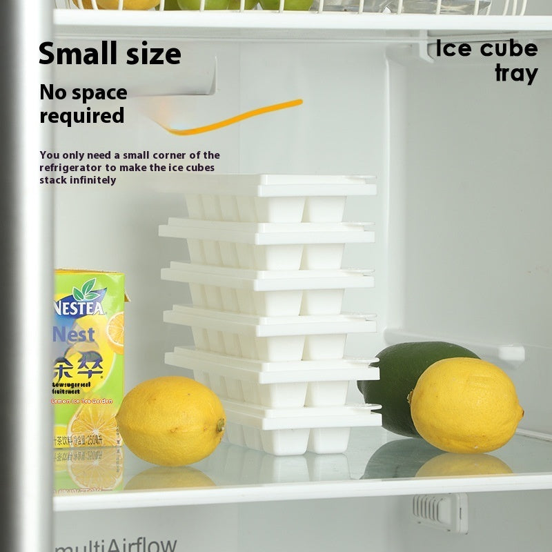 Twisting Ice Cup in a refrigerator with stacked ice cube tray and fresh lemons
