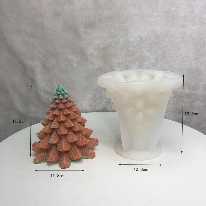 Candle Silicone Diy Mold in White next to a decorative pine tree candle for crafting projects