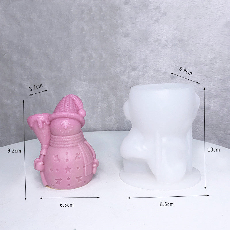 Candle Silicone DIY Mold in pink featuring a decorative snowman design for crafting enthusiasts