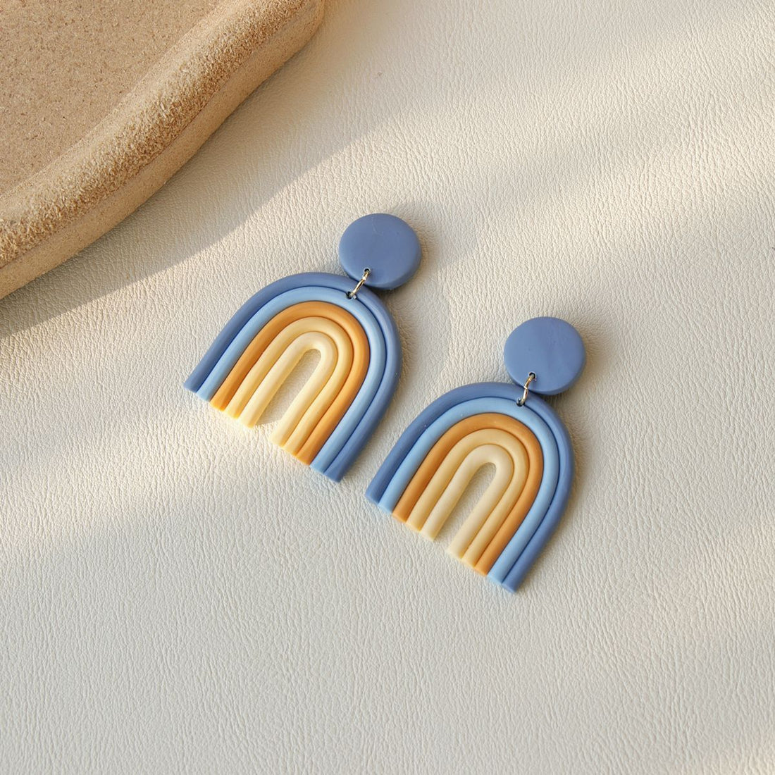Rainbow Polymer Clay Earrings in blue and beige tones with an arch design by Arts And More