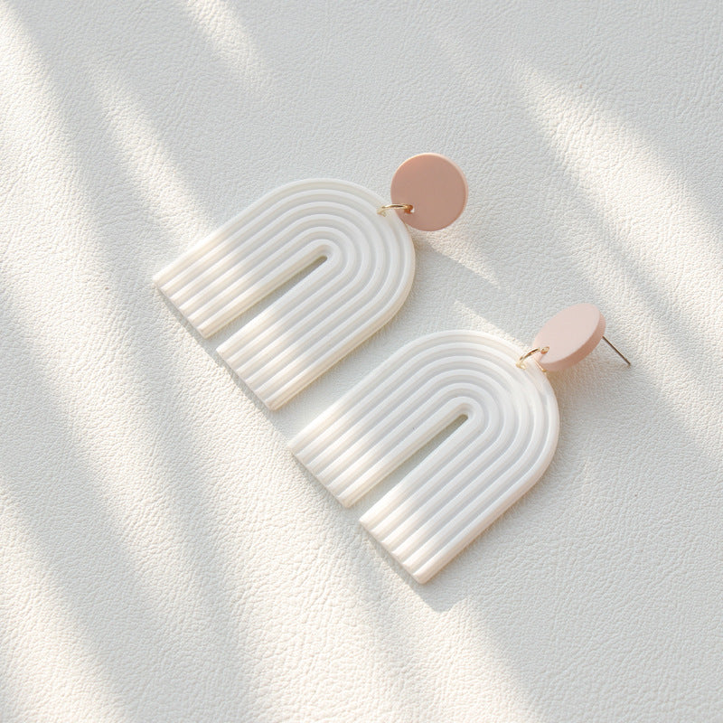 Arts And More Rainbow Polymer Clay Earrings in white and blush tones with a modern arch design