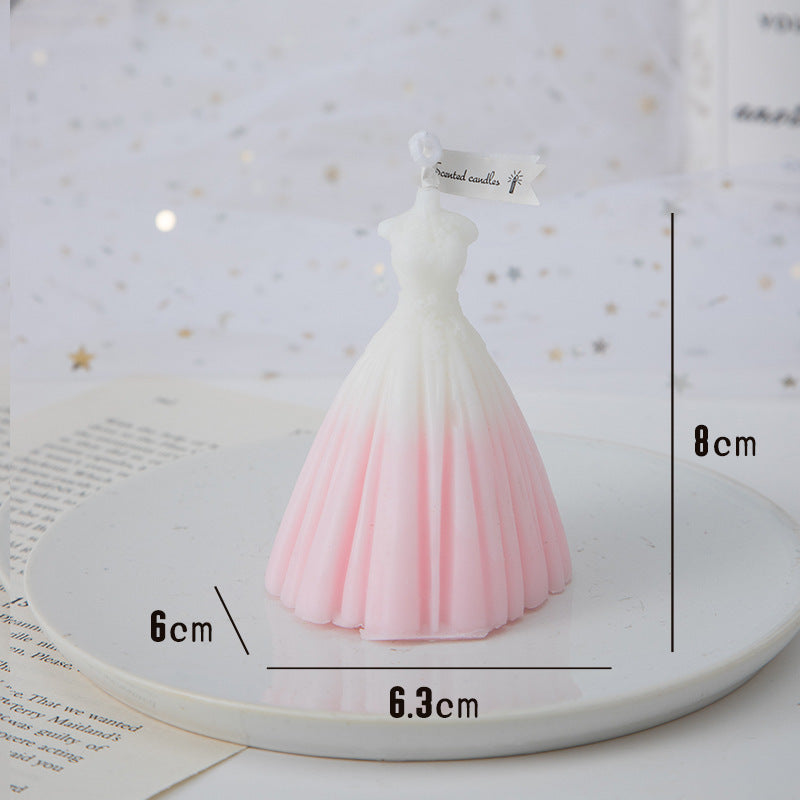Elegant wedding candles shaped like a pink dress, perfect for wedding decorations and celebrations
