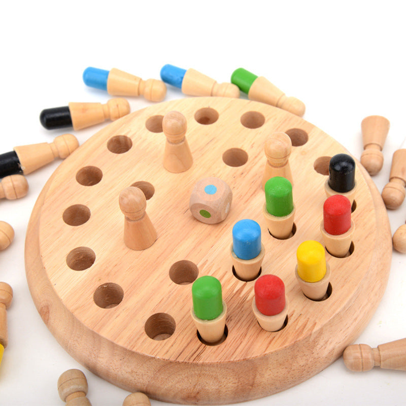 Arts And More wooden party game with colorful pegs and a multi-colored dice on a round wooden board