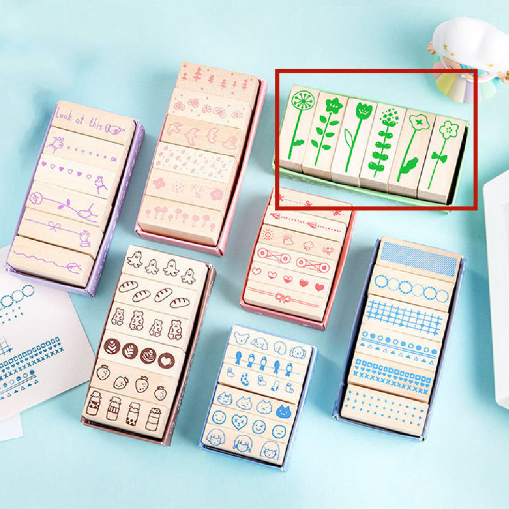 Wooden Stamp Suit by Arts And More featuring various plant and flower designs for craft projects